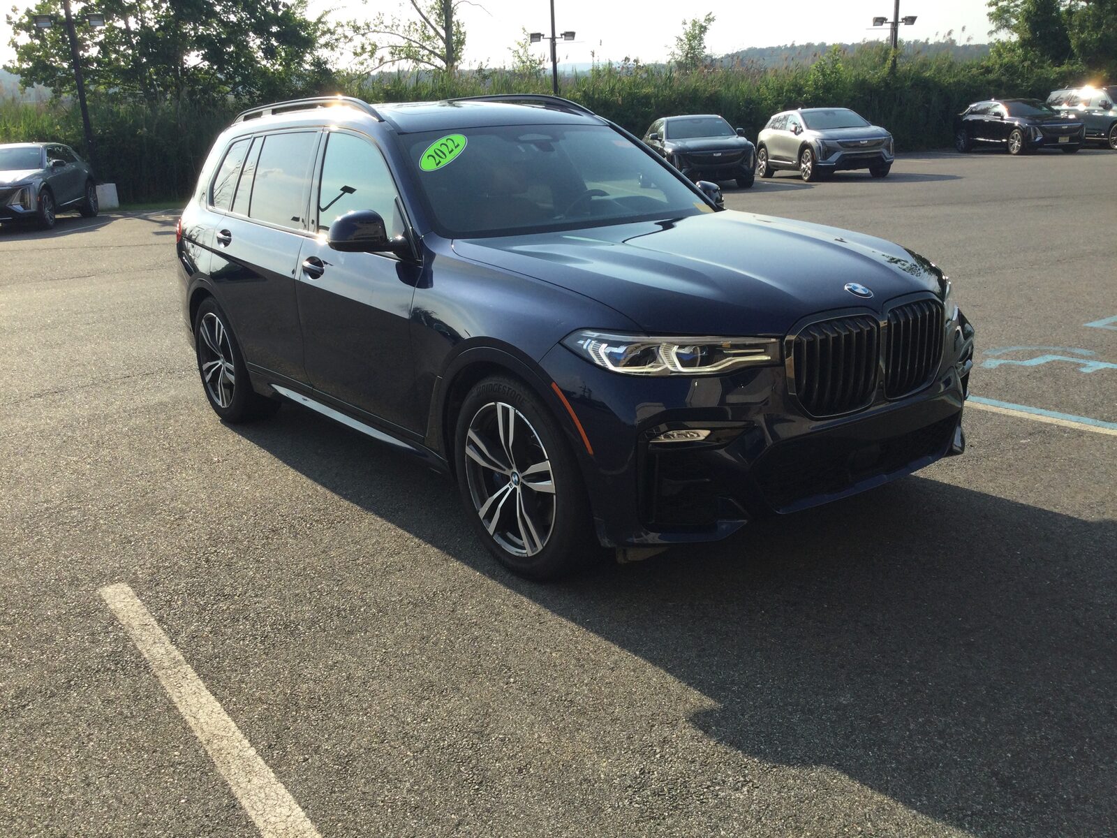 BMW SUV being inspected before purchase